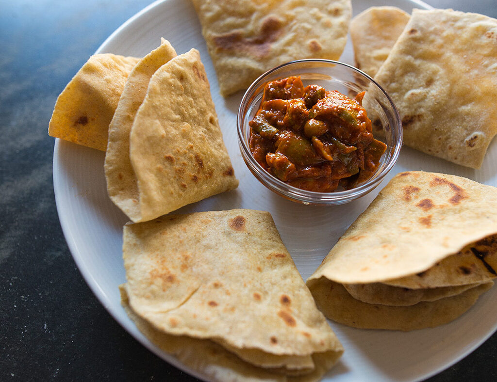 Chapati served with chicken curry